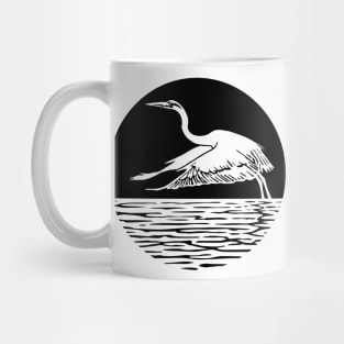 Great Blue Heron Flying in front of Sun Mug